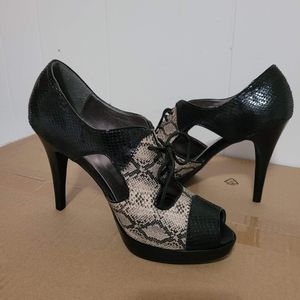 Black and faux snakeskin heels